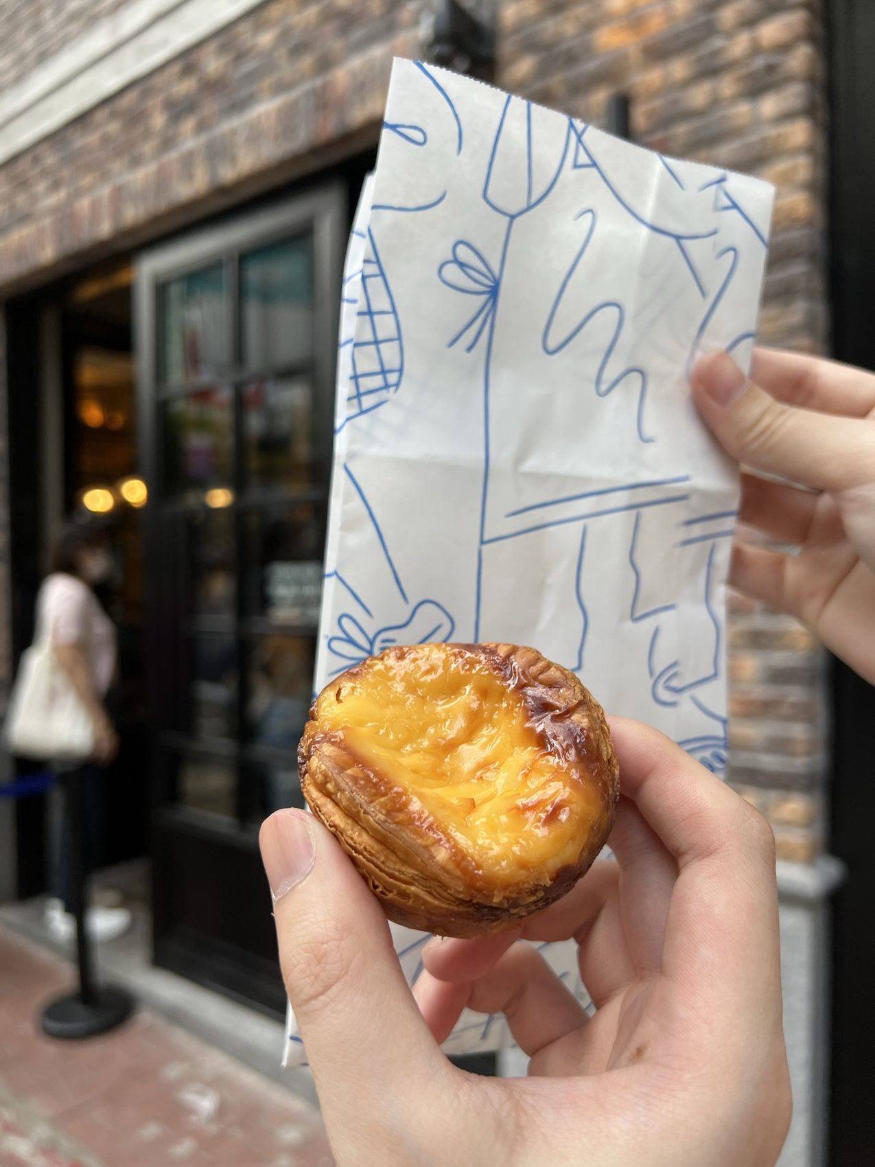 Bakehouse egg tart in a paper box
