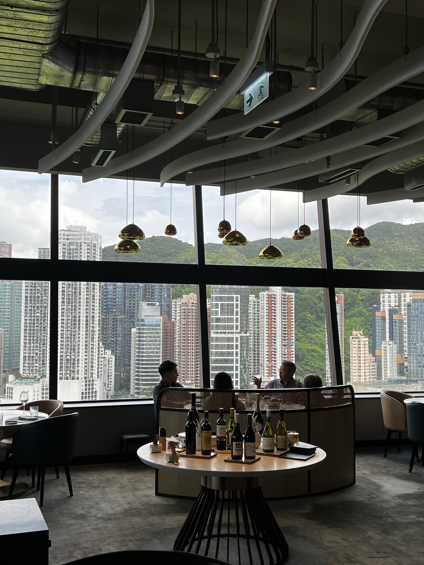 Hong Kong skyline view from an indoor dining table