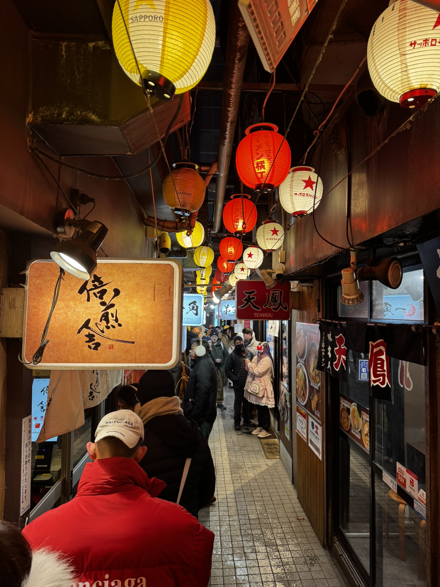 Lanterns and ramen shops inside Sapporo ramen alley