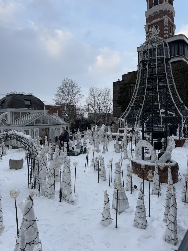 Snow-covered garden and light decorations at Shiroi Koibito Park