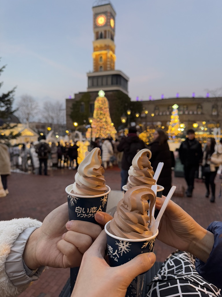 Soft serve ice cream cups outside Shiroi Koibito Park in winter