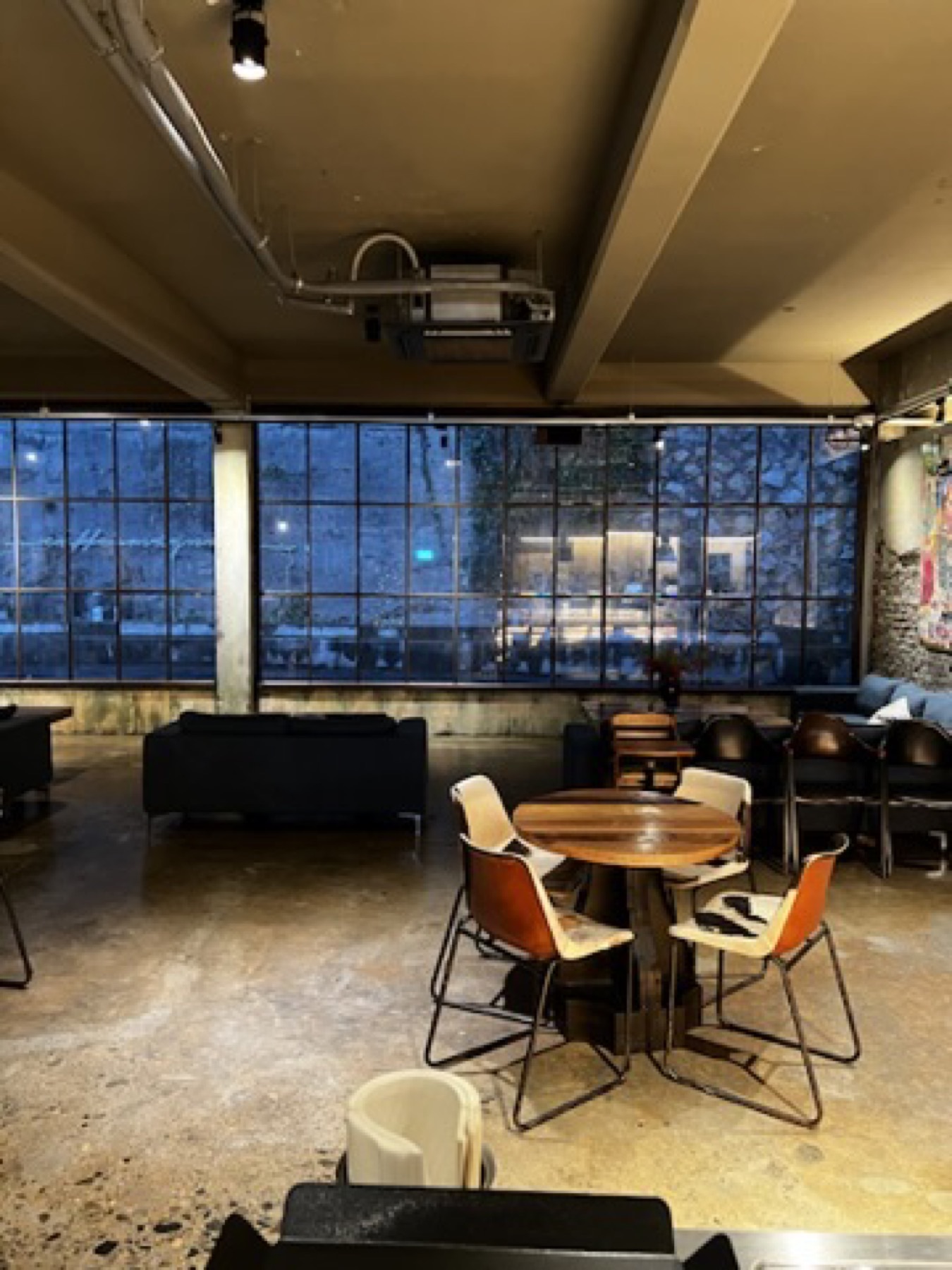 Lounge-style interior seating area at Magnate cafe in Busan