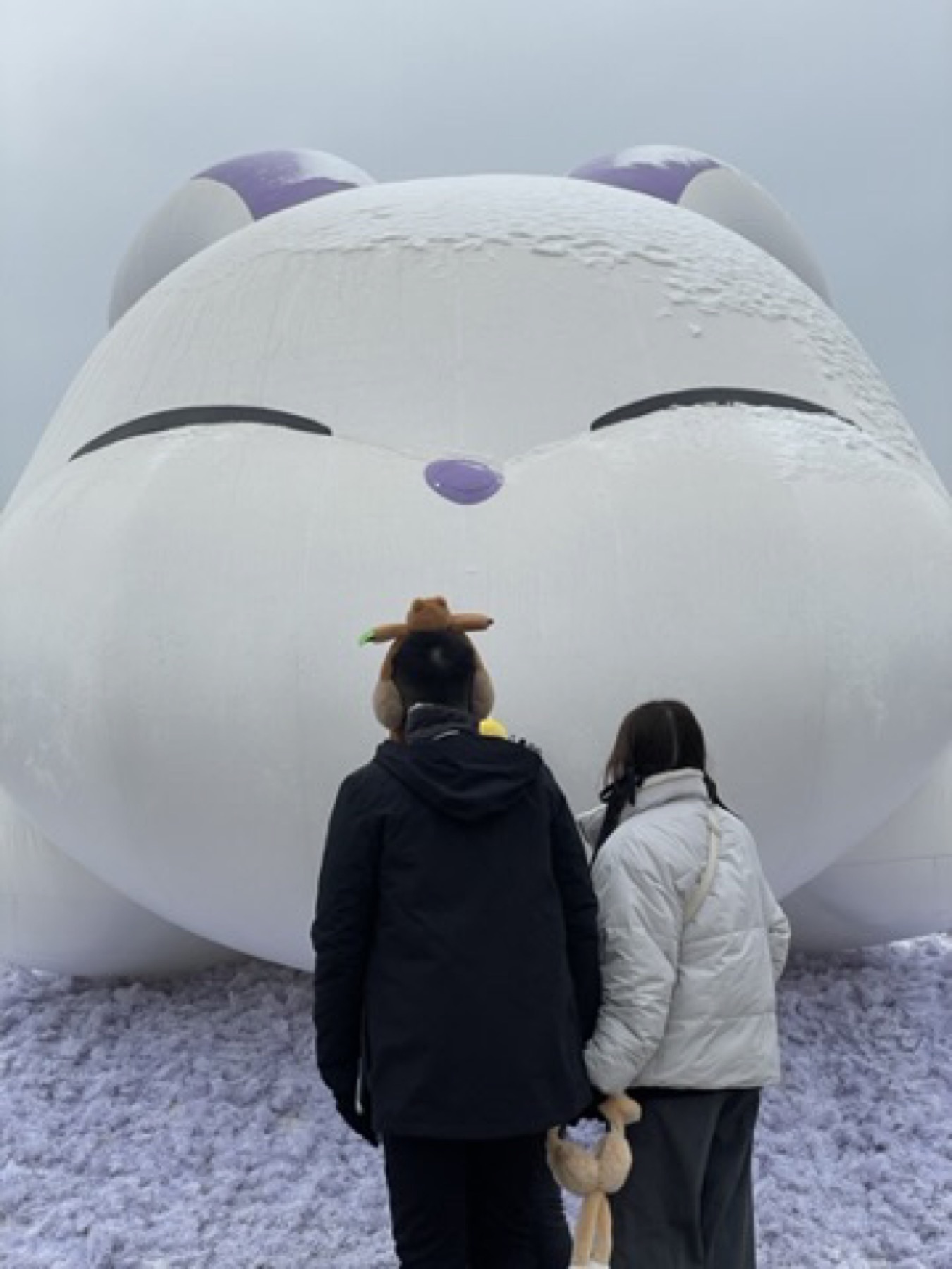 Winter day out in Gyeonggi with a large character installation and cold weather mood