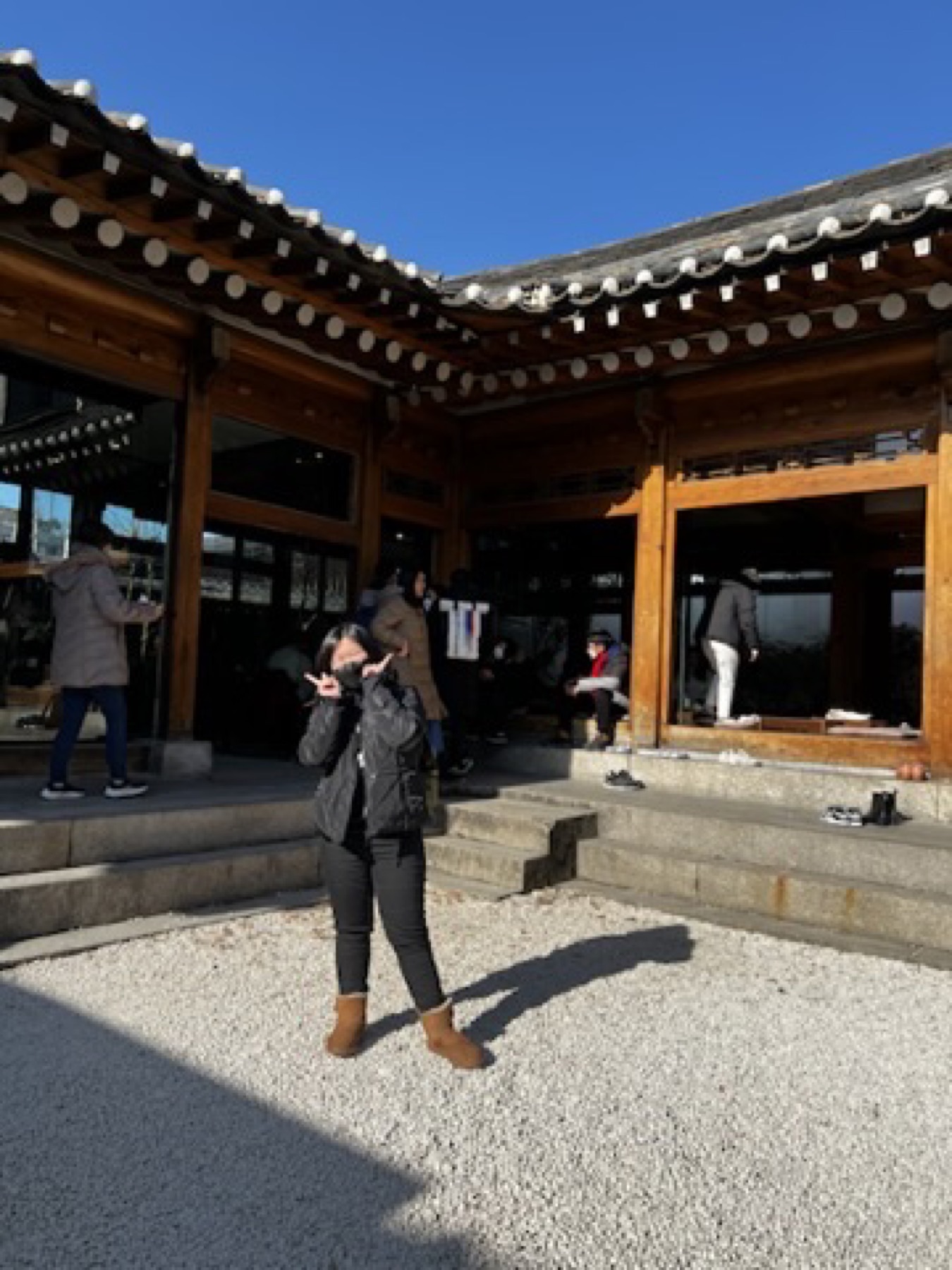 Traditional hanok courtyard building in Seoul under winter light