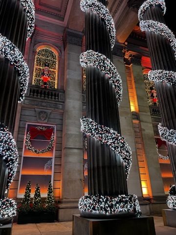Edinburgh building wrapped in warm night lights